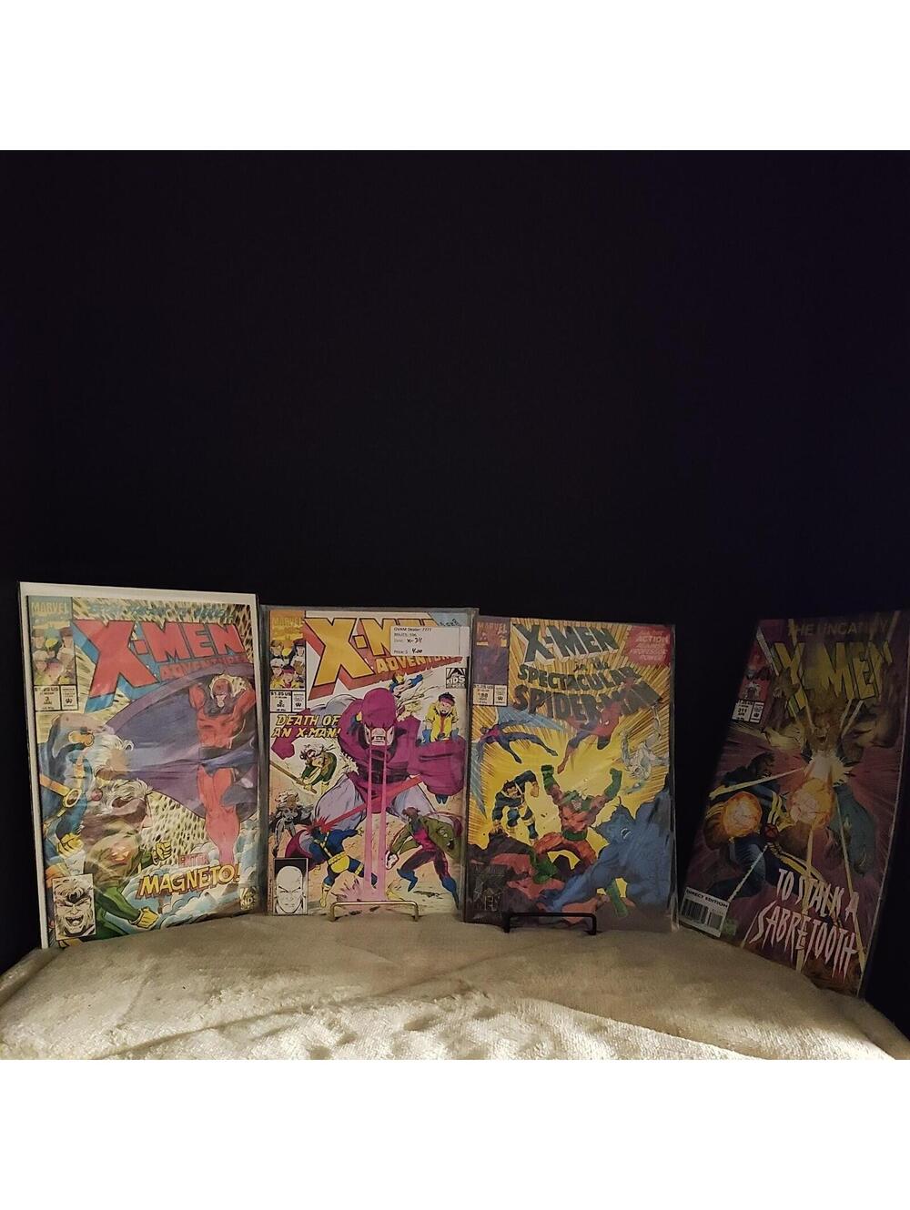 Marvel X-MEN 4 books  all protected in sleeves with cardboard